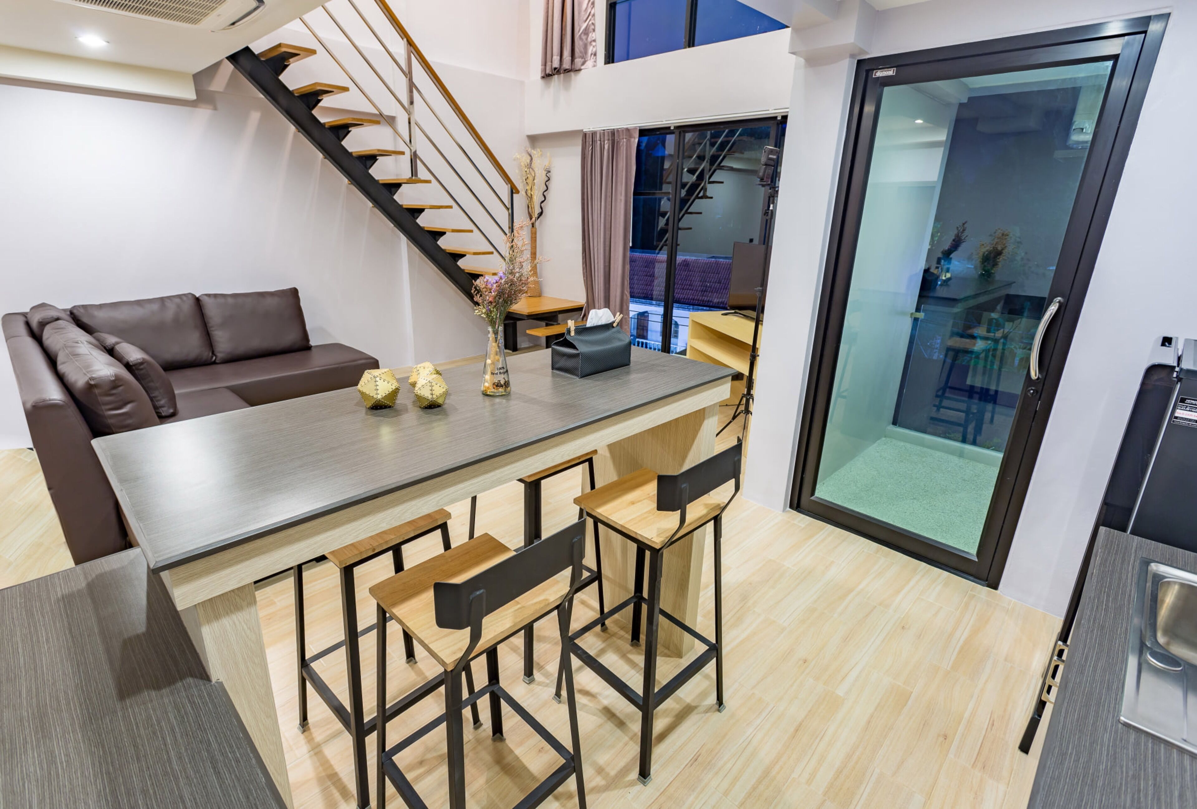 duplex suite | living area | flat-screen tv, dvd player