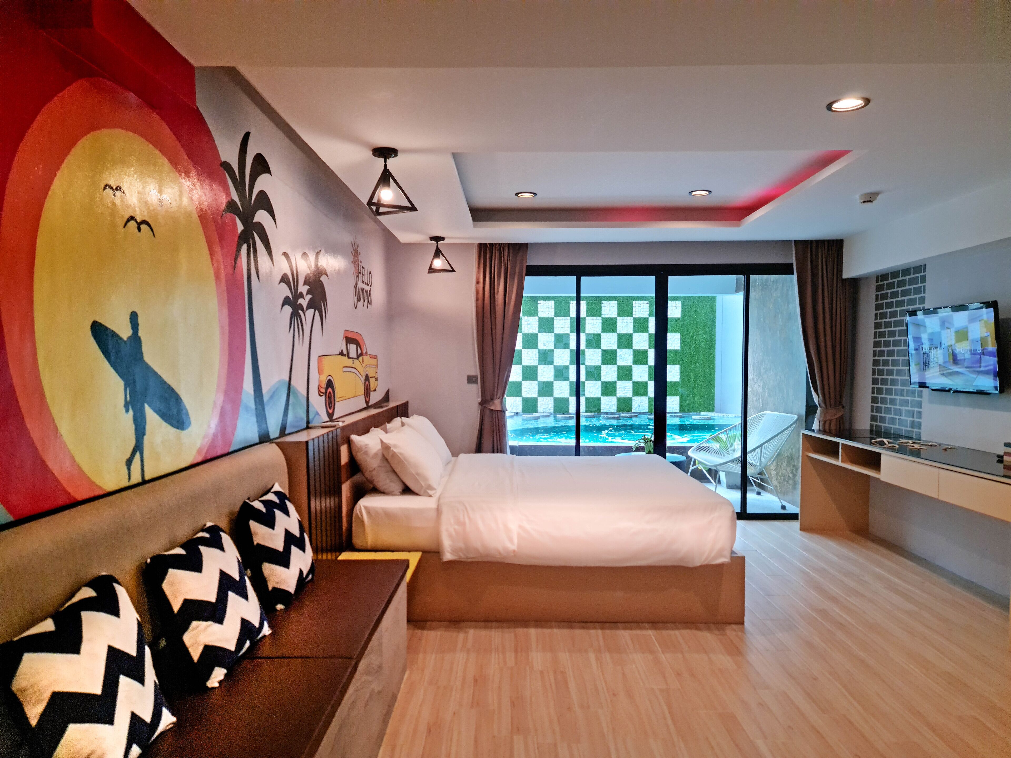 deluxe room, pool access | 1 bedroom, minibar, in-room safe, desk