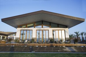 Enjoy a comfortable patio with seating and a view of the surrounding landscape.