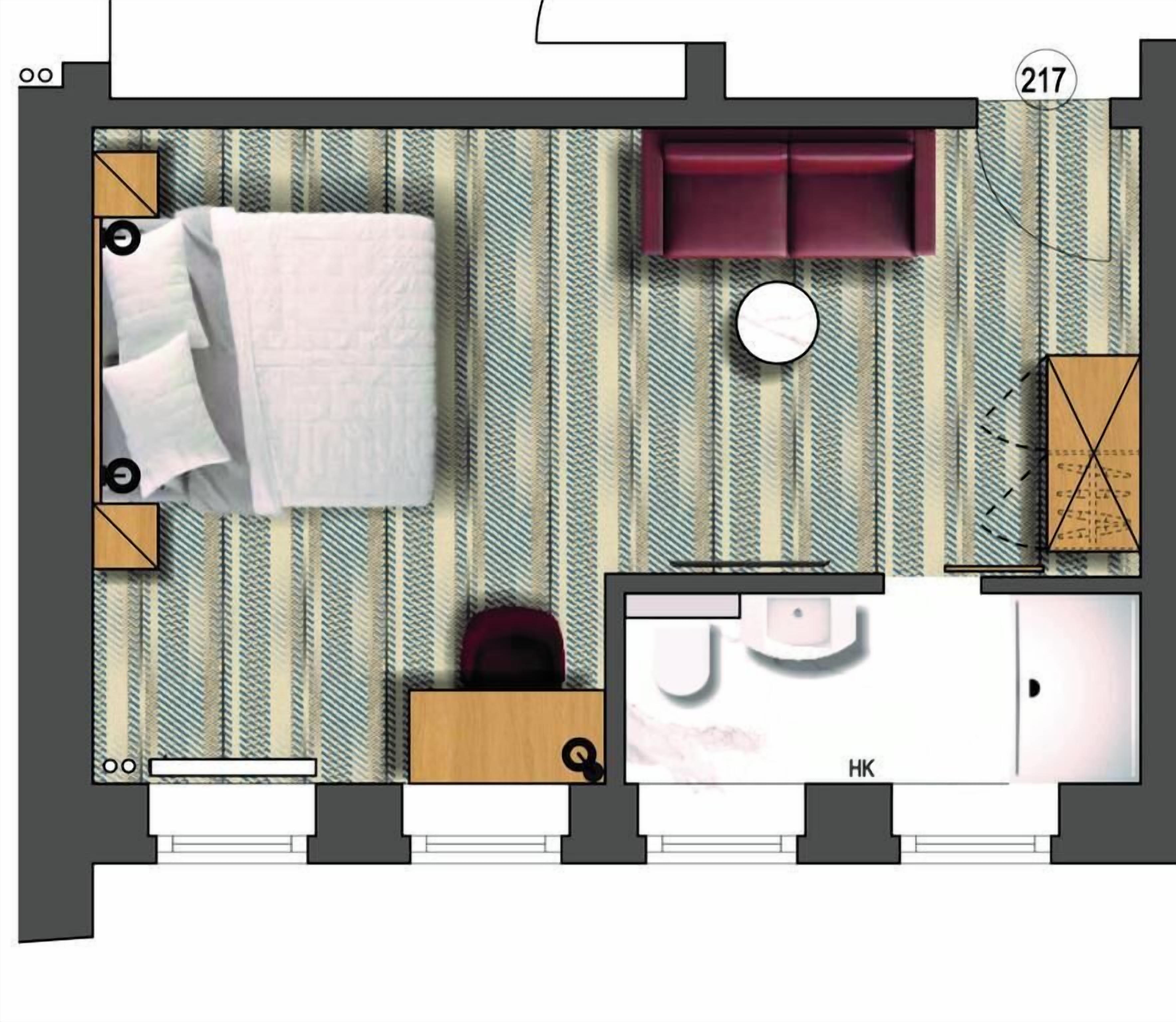 Disposizione di una camera d'albergo con un letto, una zona salotto, un piccolo tavolo, un armadio e un bagno.