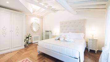 Biancheria da letto di alta qualità, minibar, cassaforte in camera