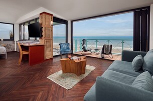 Junior Suite, 1 Double Bed, Kitchenette, Beach View | Minibar, in-room safe, desk, laptop workspace