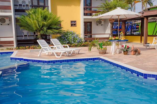 Outdoor pool, pool umbrellas, pool loungers