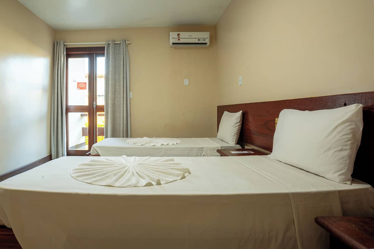1 chambre, minibar, rideaux occultants, draps fournis