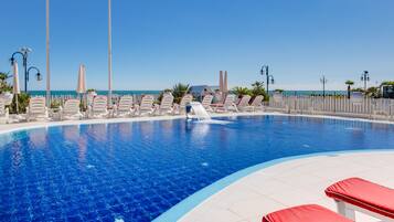 Seasonal outdoor pool, pool umbrellas, sun loungers