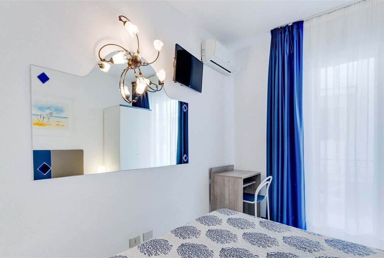 standard double room, city view | 1 bedroom, minibar, in-room safe, desk