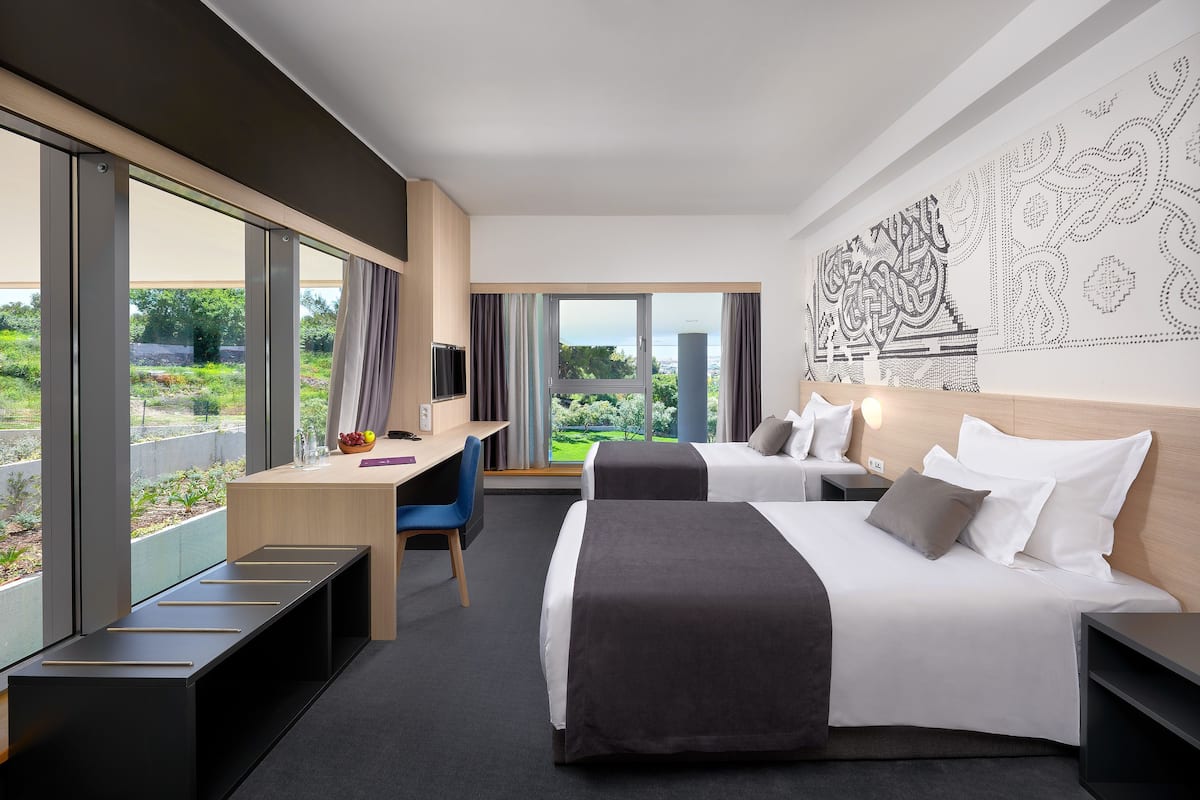 superior triple room | 1 bedroom, premium bedding, pillow-top beds, minibar