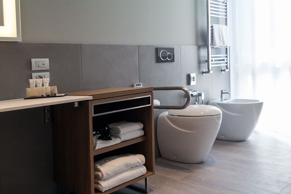 family room, 2 double beds | bathroom | shower, rainfall showerhead, free toiletries, hair dryer