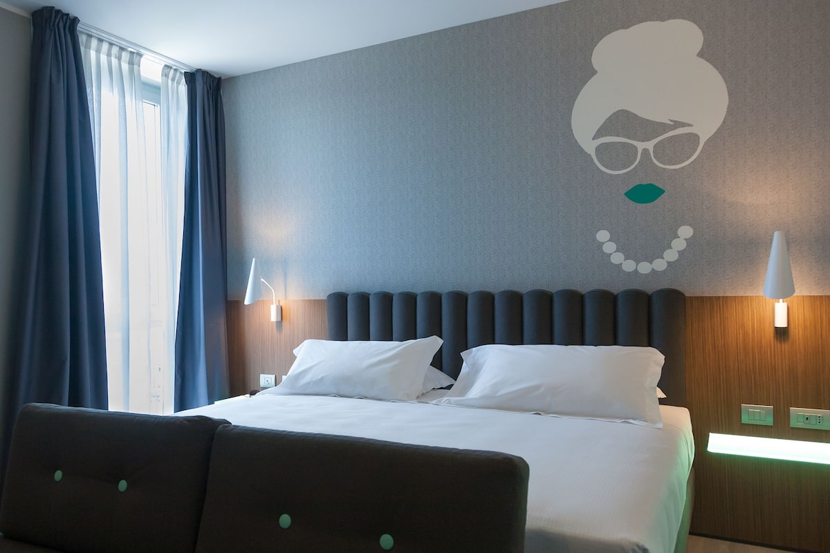 Habitación doble Deluxe | Ropa de cama de alta calidad, edredón y minibar