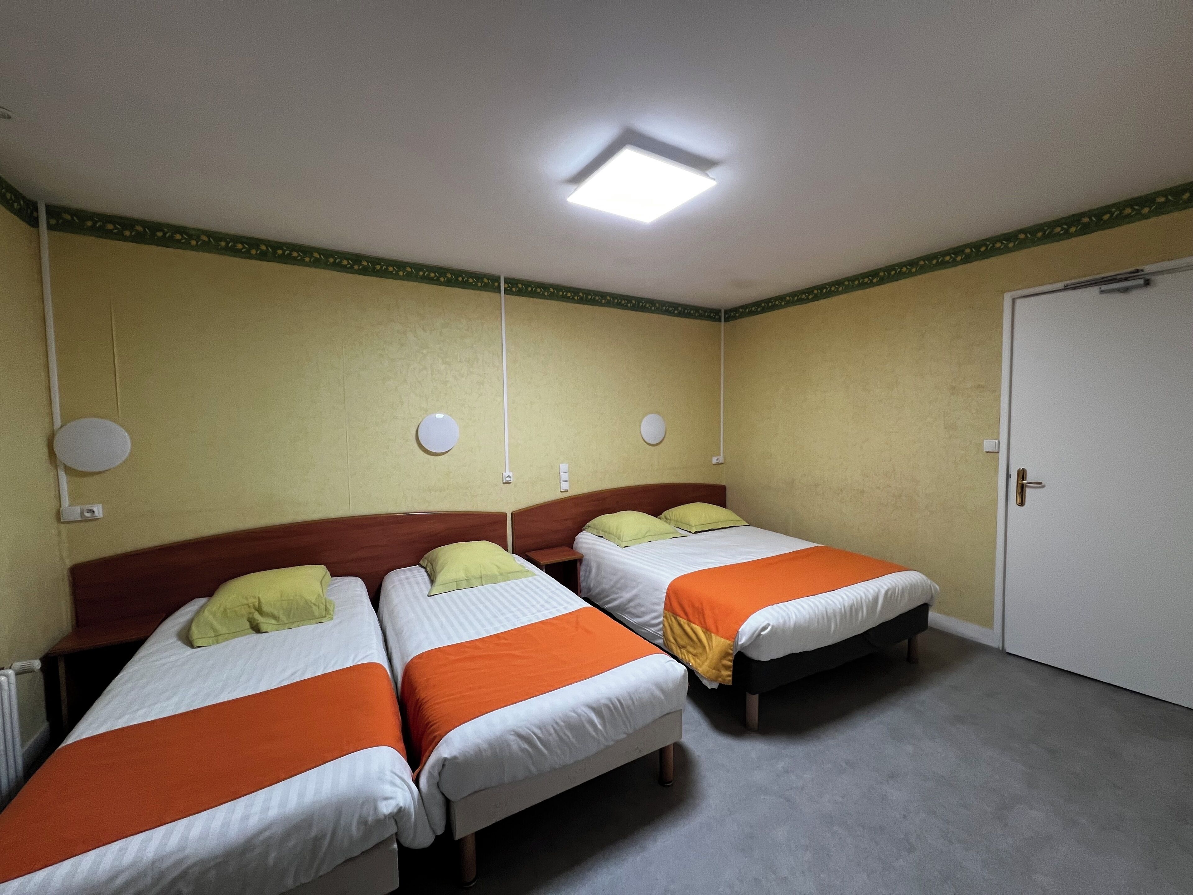 Comfort Quadruple Room | Premium bedding, individually decorated, desk, iron/ironing board