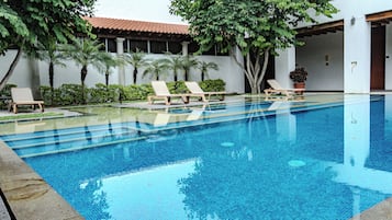 2 outdoor pools, open 8:00 AM to 8:00 PM, pool umbrellas, pool loungers