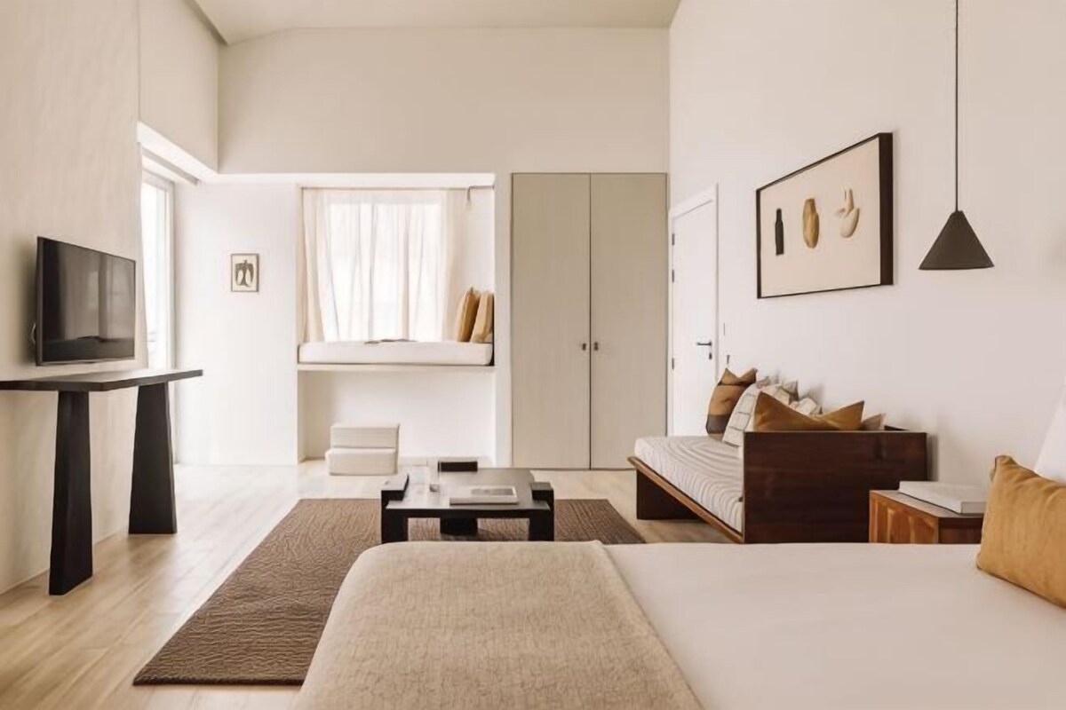 Ropa de cama de alta calidad, camas con efecto memoria y minibar 