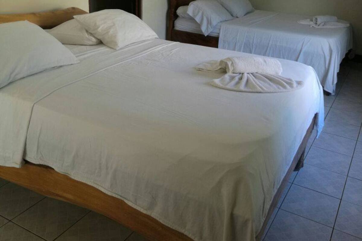 Habitación cuádruple estándar, 2 camas matrimoniales | Minibar y wifi gratis
