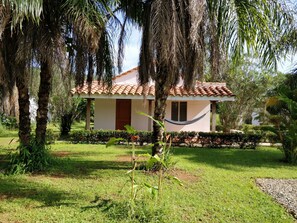 Deluxe Cottage, 2 Queen Beds, Garden View | 1 bedroom, rollaway beds, free WiFi