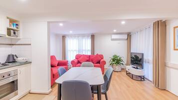 Deluxe-studiosviitti | Oleskelualue | Taulutelevisio