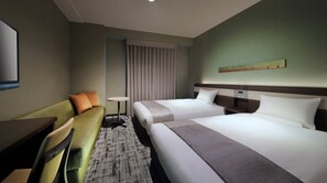 Kamar Twin Deluks, Bebas Asap Rokok | Meja kerja, ruang kerja ramah laptop, Wi-Fi gratis, dan seprai linen