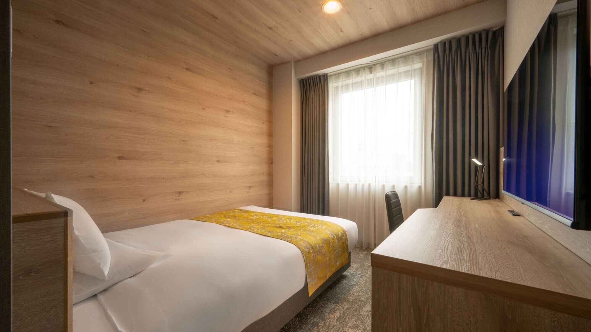 尊荣单人房, 无烟房 | 办公桌、笔记本电脑工作区、免费 WiFi、床单