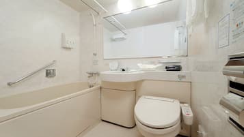 Combined shower/tub, free toiletries, hair dryer, slippers