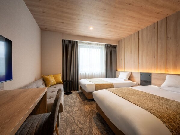 Desk, laptop workspace, free WiFi, bed sheets