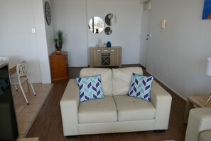 Two Bedroom Apartment | Living room | Flat-screen TV, fireplace