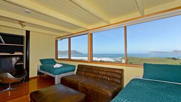 Panoramic House, 3 Bedrooms, Ocean View, Beachfront | Living area | Flat-screen TV, fireplace, DVD player