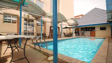Outdoor pool, open 8 AM to 8:30 PM, pool loungers