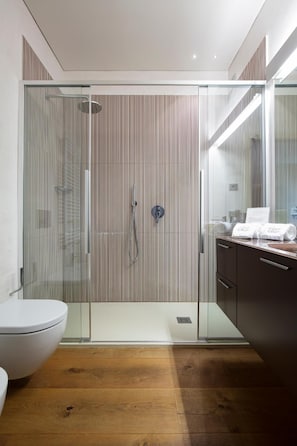 Shower, free toiletries, hair dryer, slippers