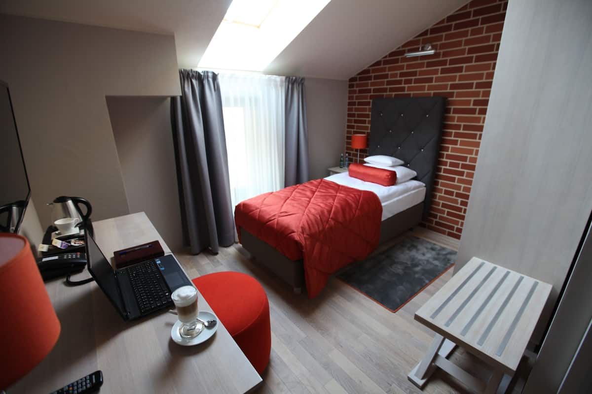 Habitación individual | Sábanas de algodón egipcio, ropa de cama de alta calidad, minibar