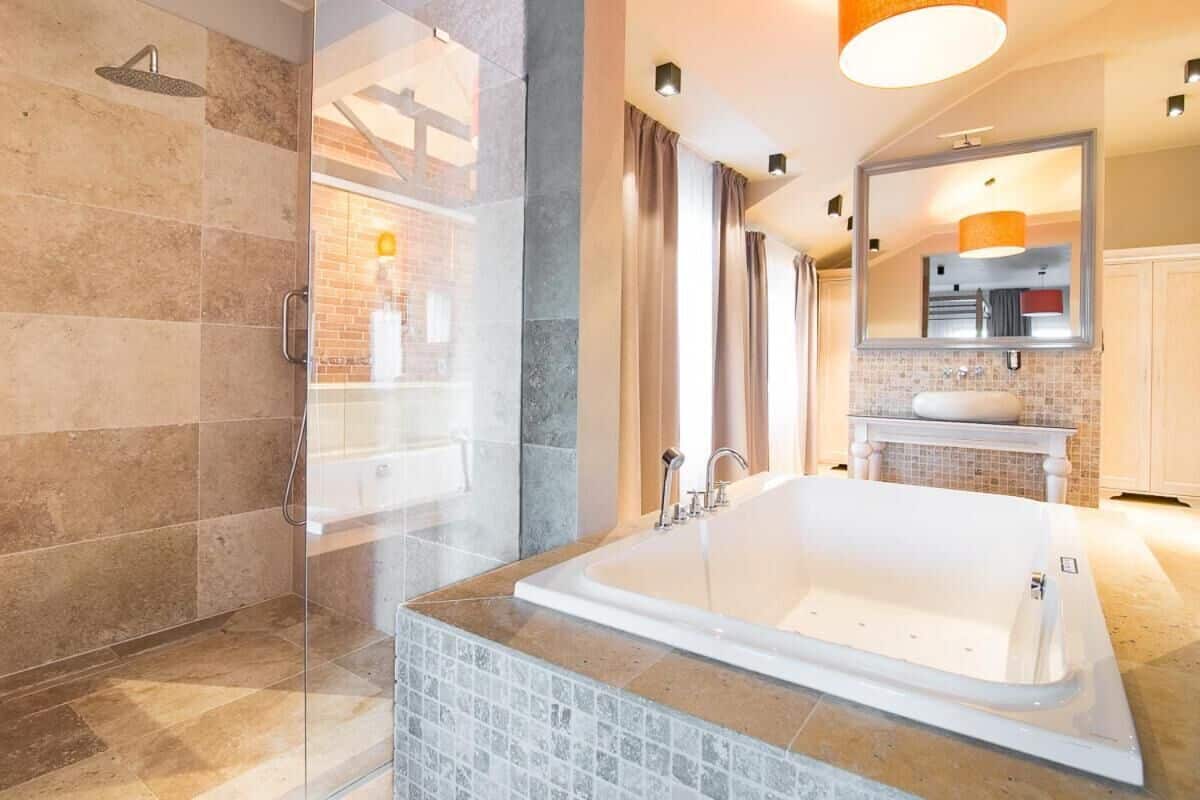 exclusive studio suite | bathroom | shower, free toiletries, hair dryer, towels