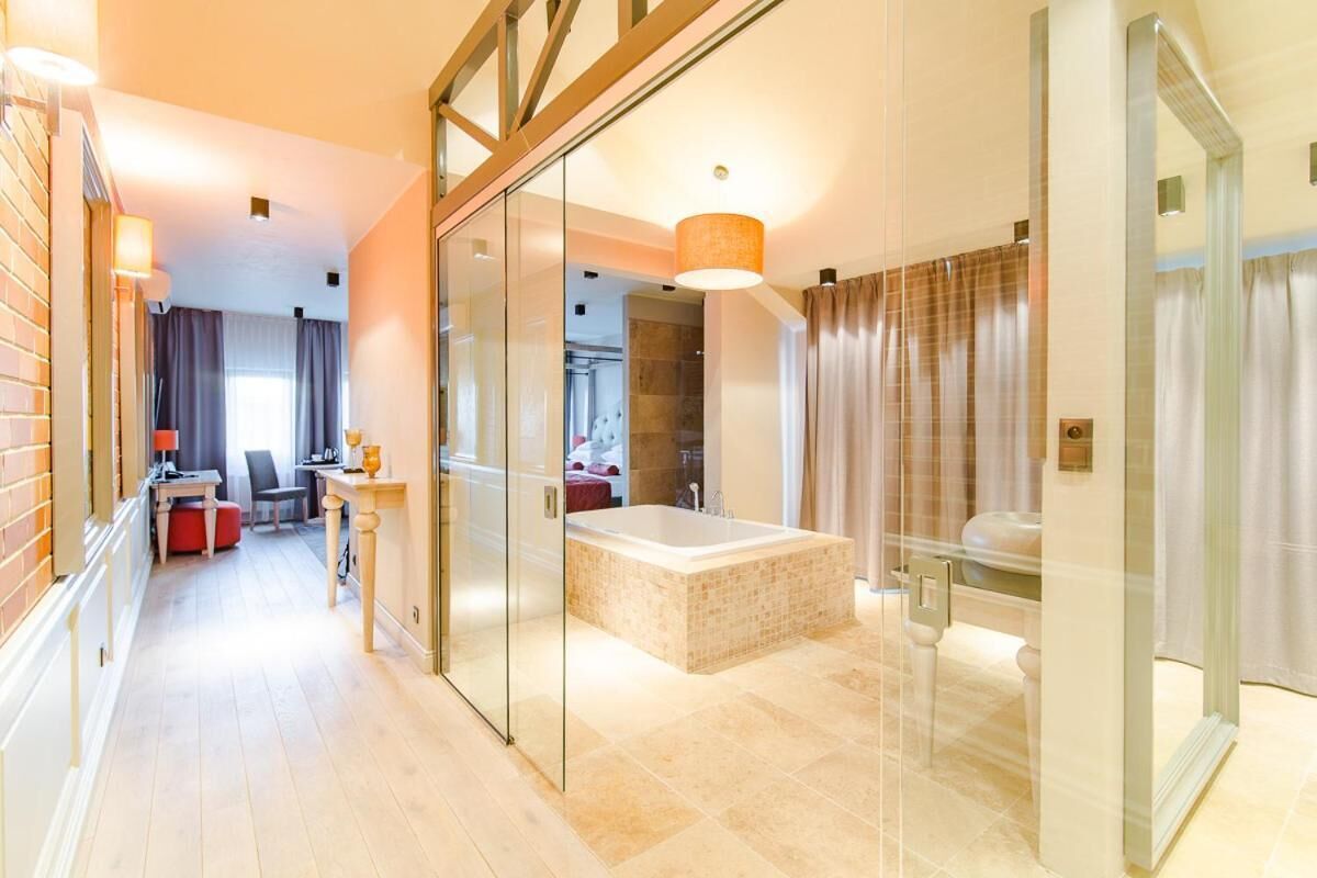 exclusive studio suite | bathroom | shower, free toiletries, hair dryer, towels