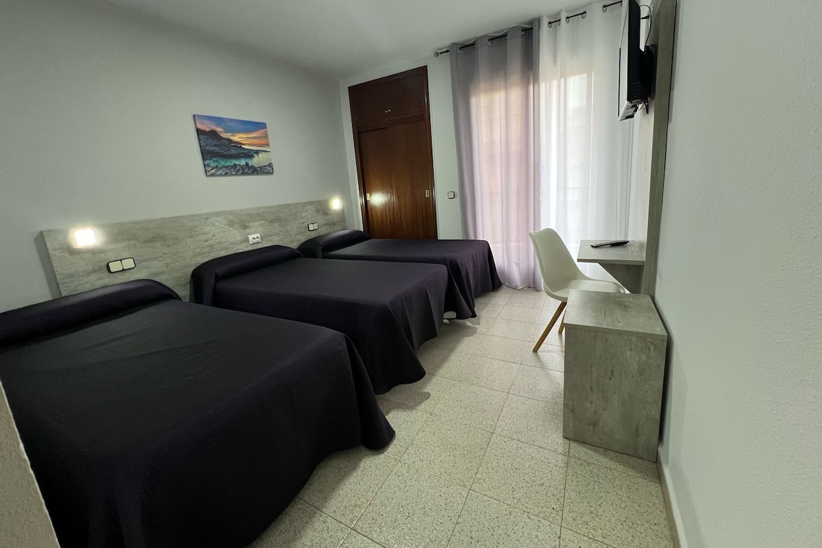Triple Room | In-room safe, individually decorated, desk, laptop workspace