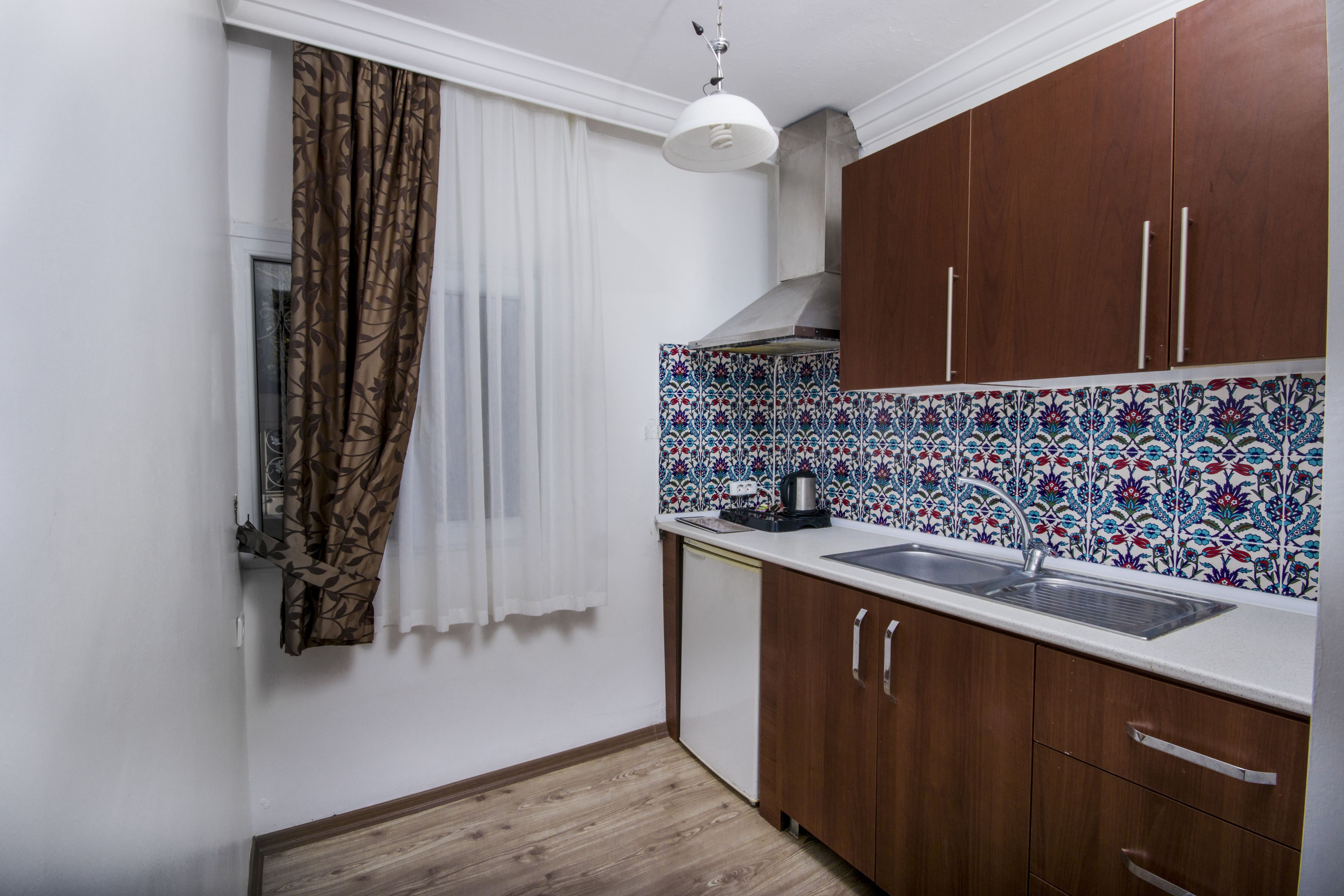 grand suite, 2 bedrooms | living area | flat-screen tv