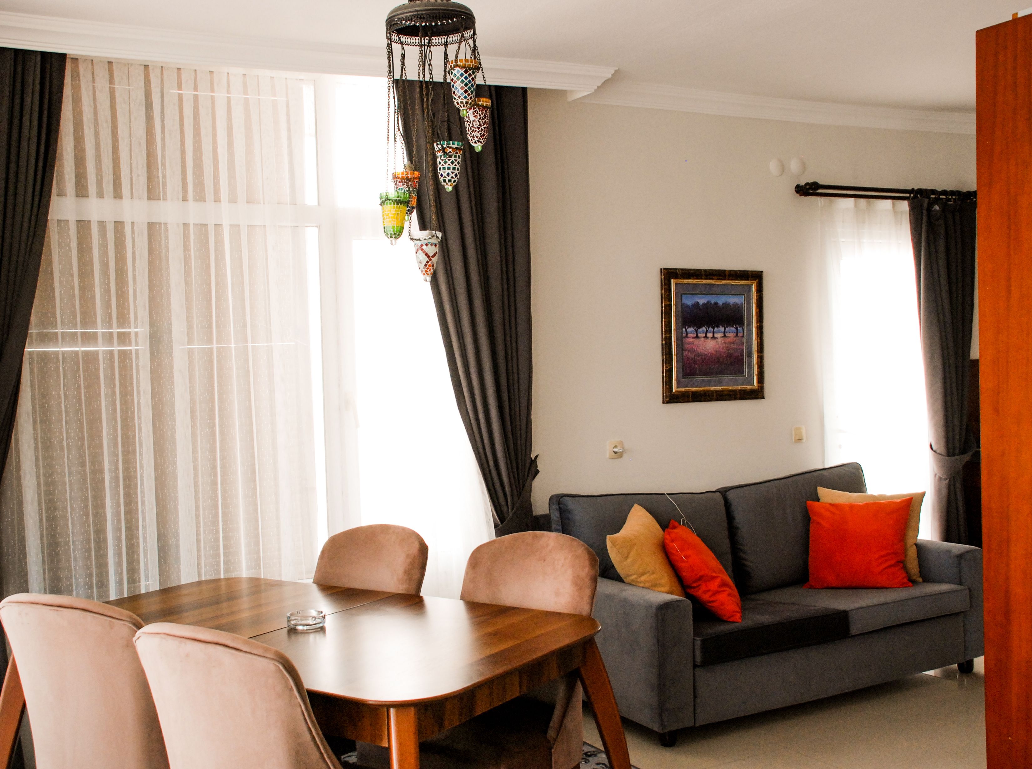 exclusive suite, 2 bedrooms, sea view, beachfront | living area | flat-screen tv