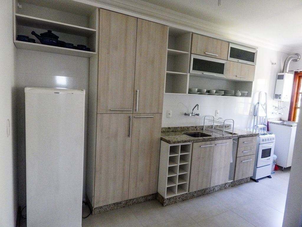 Apartamento, 2 quartos | Cozinha privada | Geladeira, micro-ondas, fogão, cooktop