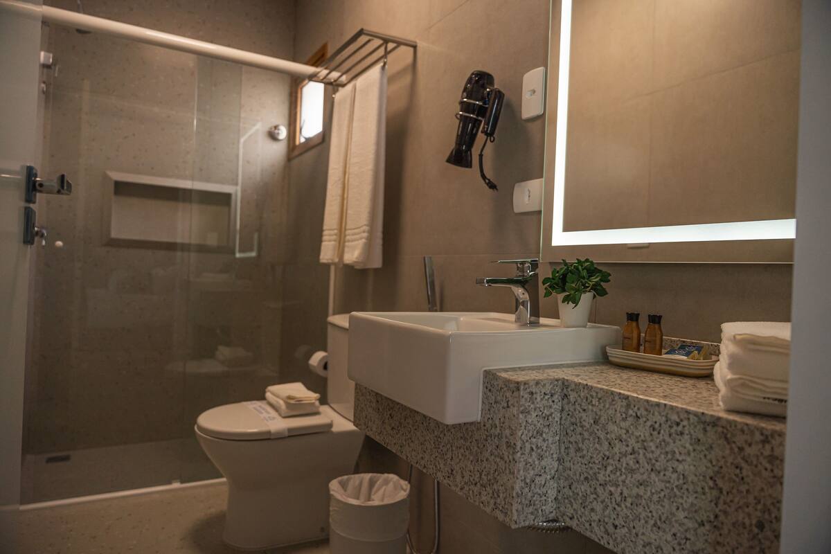 royal suite | bathroom | shower, hair dryer, towels