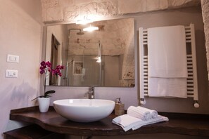 Apartment, 1 Bedroom | Bathroom | Shower, free toiletries, hair dryer, bathrobes - Almapetra Trulli Resort (Locorotondo)