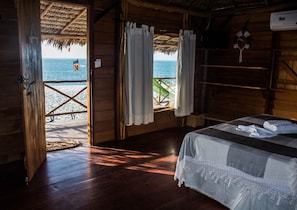 Panoramic Bungalow, Beach View | Minibar, in-room safe, iron/ironing board, free WiFi
