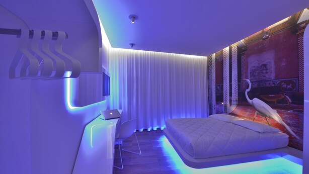 A modern bedroom with a bed, a desk with a laptop, and a large window with curtains. - Trevi Elite Rome (Rome)