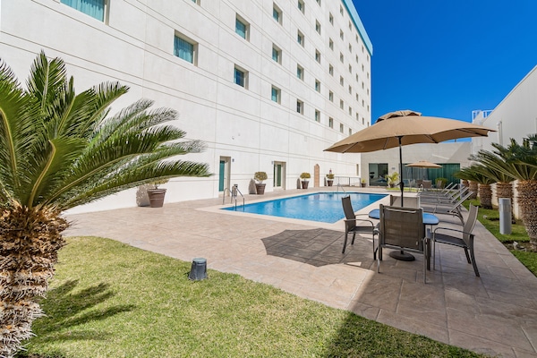 Outdoor pool, sun loungers