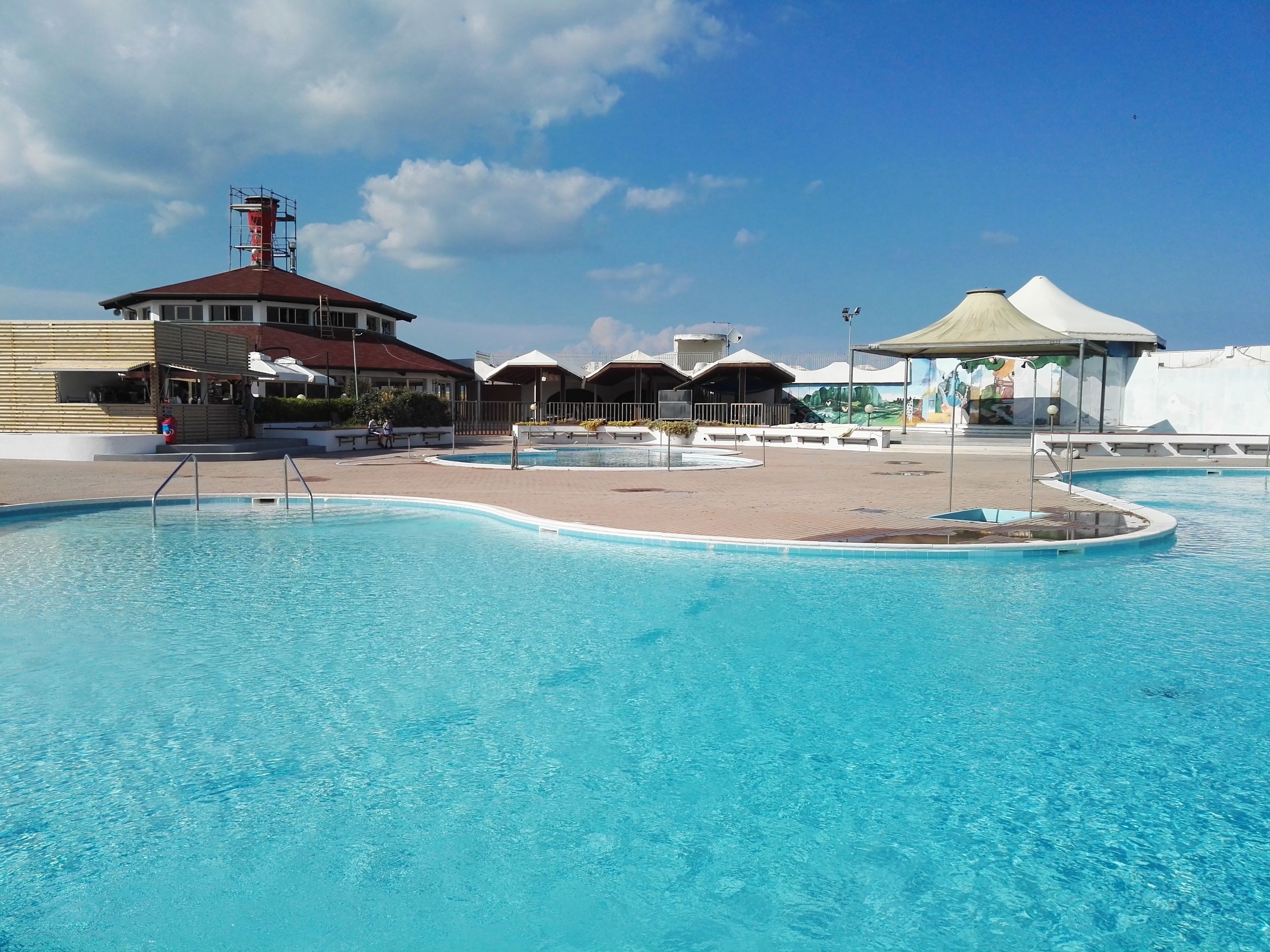 seasonal outdoor pool, pool umbrellas, pool loungers