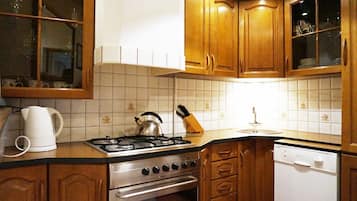 Deluxe Apartment, 1 Bedroom (Swietojanska 7/1) | Private kitchen | Fridge, stovetop, coffee/tea maker, electric kettle