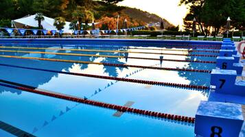 Seasonal outdoor pool, pool umbrellas, sun loungers