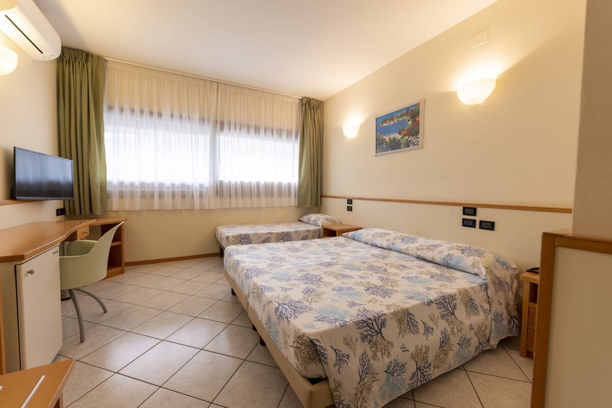 Minibar, desk, blackout curtains, bed sheets