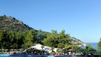 Seasonal outdoor pool, pool umbrellas, pool loungers