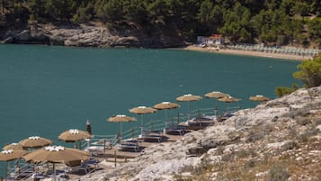 Playa privada, arena blanca, traslado desde/hacia la playa