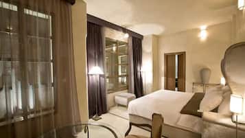 Suite Supérieure | Literie de qualité supérieure, coffres-forts dans les chambres
