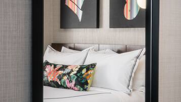 Premium bedding, down comforters, in-room safe, desk