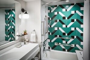 Designer toiletries, hair dryer, bathrobes, towels