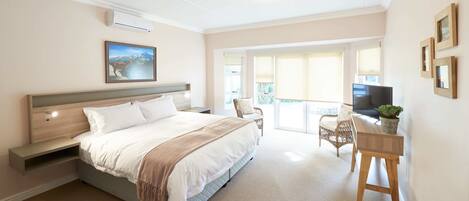 Premium bedding, down comforters, memory foam beds, in-room safe