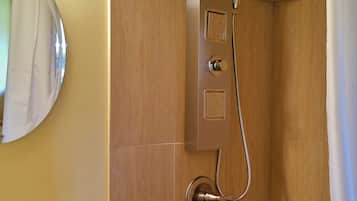 Deluxe Room, 1 Bedroom, Private Bathroom, Garden Area | Bathroom | Shower, hydromassage showerhead, designer toiletries, hair dryer
